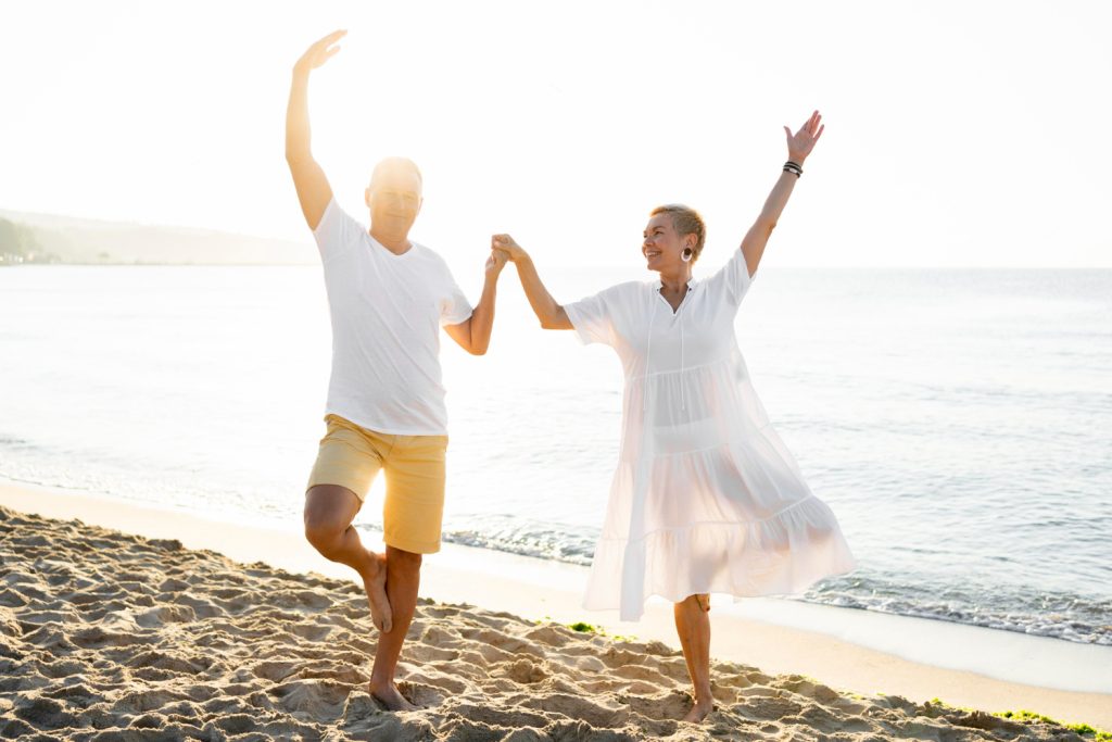 Couple dancing on beach